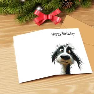 Detail of happy birthday card with cartoon dog illustration and kraft paper envelope