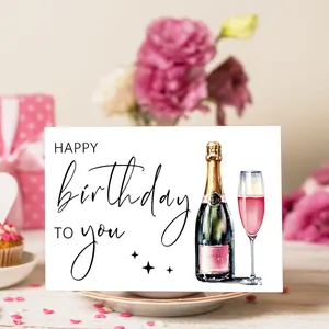 Biglietto di auguri acquerello con champagne e scritta artistica Happy Birthday