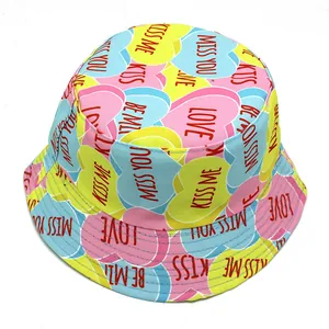 Colorful bucket hat with candy heart prints like LOVE and BE MINE for outdoor sun protection