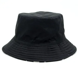 Classic reversible black bucket hat for men and women with mushroom print lining for sun protection