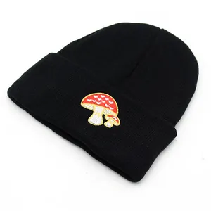 Black knitted beanie with colorful mushroom embroidery for winter outdoor fashion