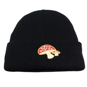 Black knit beanie with red mushroom heart embroidery for winter outdoor fashion