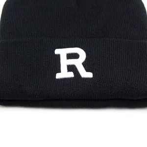 Classic black knitted beanie with white letter R embroidery for outdoor autumn warmth