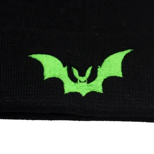 Black knitted beanie hat with vibrant green bat embroidery for men and women