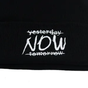 Black knit beanie with NOW embroidery detail for men and women outdoor winter warmth