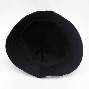 Double-sided plaid bucket hat for men and women featuring a black cotton inner lining