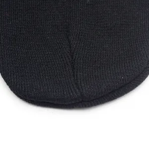 Close-up of top stitching on black embroidered bat knitted beanie for men and women
