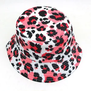 Pink and black leopard print bucket hat with stitched brim on white background