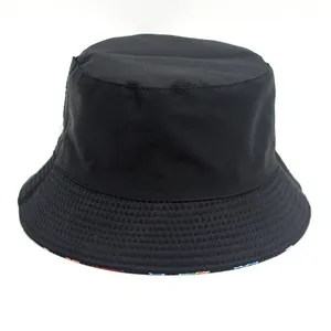 Classic black reversible bucket hat with colorful inner print for outdoor sun protection