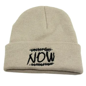 Knitted beige beanie with NOW embroidery detail for men and women outdoor winter wear