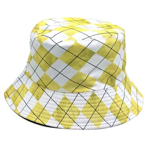 Detail of yellow and white plaid bucket hat showing fine stitching and twill fabric