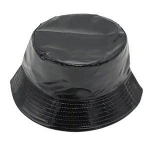 Glossy black PU leather bucket hat with minimalist waterproof finish and retro punk style
