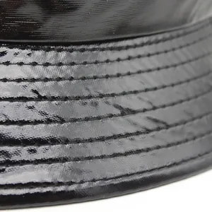 Retro punk style black PU leather bucket hat with glossy finish and durable stitching lines