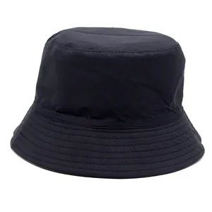 Classic black PU leather bucket hat with minimalist design and reinforced stitching brim