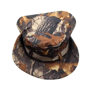 Close-up of jungle camo boonie hat featuring wide brim and breathable metal air vents