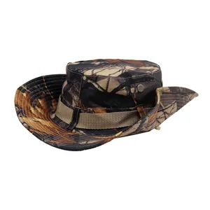 Detail of camouflage boonie hat showing metal air vents and snap buttons for hiking