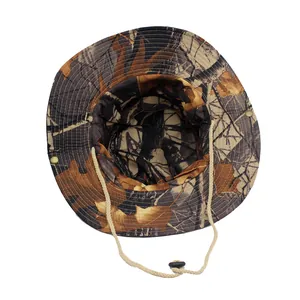 Detail of leaf camouflage boonie hat featuring adjustable wind cord and wide brim texture
