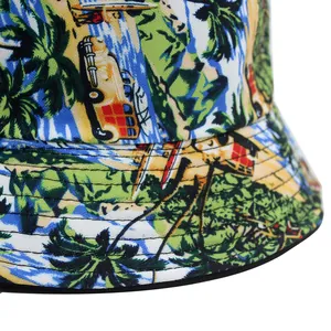 Reversible bucket hat with tropical Hawaiian print featuring palm trees and vintage cars