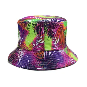 Unisex bucket hat with vibrant tropical palm leaf print for outdoor sun protection