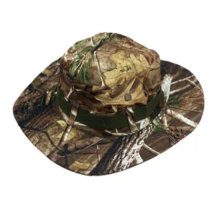 Macro detail of camouflage boonie hat featuring metal eyelets and tactical nylon webbing