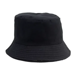 Minimalist black cotton sun bucket hat for women with reversible summer beach vacation design