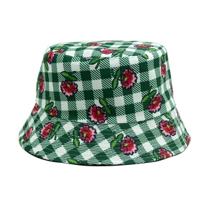 Green and white gingham bucket hat with delicate pink flower embroidery for outdoors