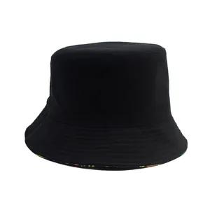 Double-sided black bucket hat with stylish dinosaur pattern print and sun protection