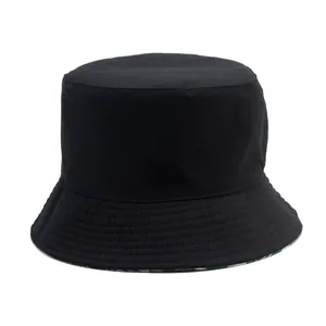Black cotton canvas bucket hat with sun protection and floral inner pattern design