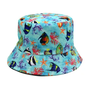 Blue reversible bucket hat featuring tropical fish and starfish print for outdoor wear