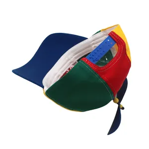 Detail of multi-color propeller hat featuring adjustable blue snapback and cotton fabric
