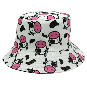 Reversible bucket hat with cute cartoon cow print for sun protection and casual wear