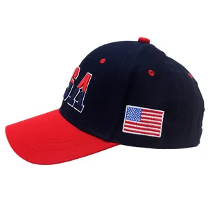 Close-up of USA 3D embroidery and American flag patch on navy and red cotton baseball cap