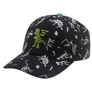 Kids black cotton baseball cap with white dinosaur skeleton print and green patch design