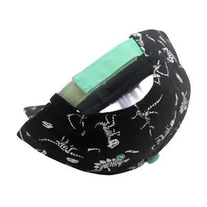 Kids black cotton baseball cap with white dinosaur skeleton print and mint green strap