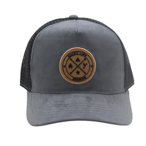 Close-up of suede texture and outdoor embroidery on mesh trucker baseball cap