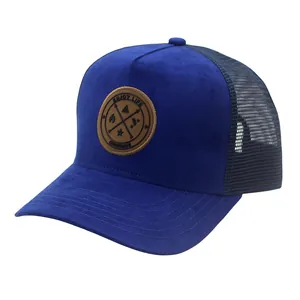 Close-up of blue faux suede truck hat with mesh back and Enjoy Life leather patch