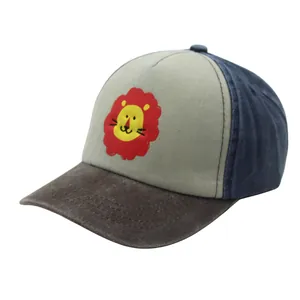 Close-up of a color-block kids baseball cap featuring a cute cartoon lion patch