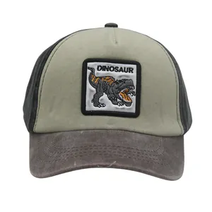 Detailed view of tricolor kids dinosaur baseball cap with embroidered patch and suede brim