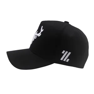 Detailed view of the 3D white antler embroidery on a black cotton baseball cap