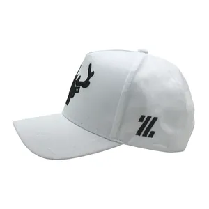 Detailed view of the deer horn embroidery on white cotton baseball cap with side patterns