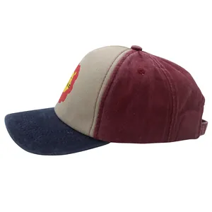 Detail of multi-color washed cotton baseball cap featuring cartoon lion embroidery