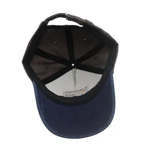 Detailed interior of the kids dinosaur baseball cap with metal buckle and stitching