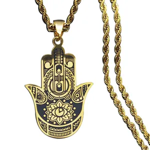 Collier avec pendentif Main de Fatma et Œil de Protection doré avec chaîne torsadée
