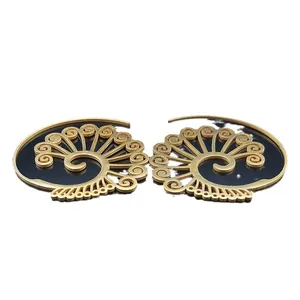 Bohemian gold stainless steel hollow floral ear weights with intricate ethnic spiral patterns