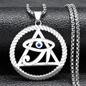 Macro shot of silver Eye of Horus pyramid pendant with blue stone on black leather
