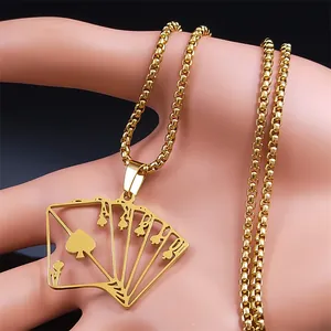 Detailed view of a gold spade ace poker pendant on a sturdy box chain necklace