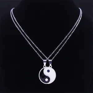 Matching Tai Chi Yin Yang pendant necklaces for couples in polished stainless steel