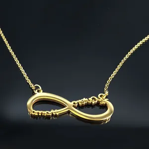 Collier infini en acier inoxydable doré avec pendentif Te Quiero et Amor sur surface noire