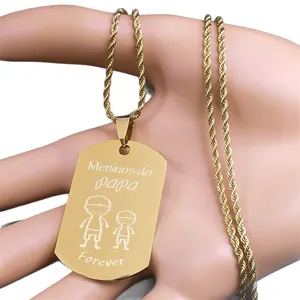 Gold stainless steel dog tag necklace with Meninos do Papa engraving and rope chain