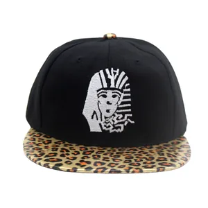 Hip hop snapback hat featuring Egyptian Pharaoh embroidery and leopard print brim detail
